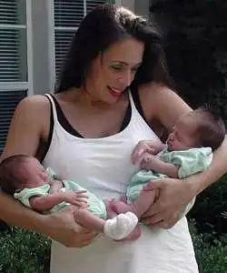 mom holding twins born at 36 weeks