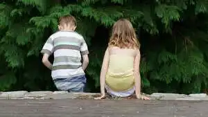 boy and girl sitting down