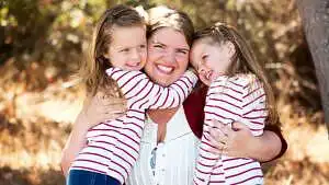 Tracy Murdock and identical twin daughters