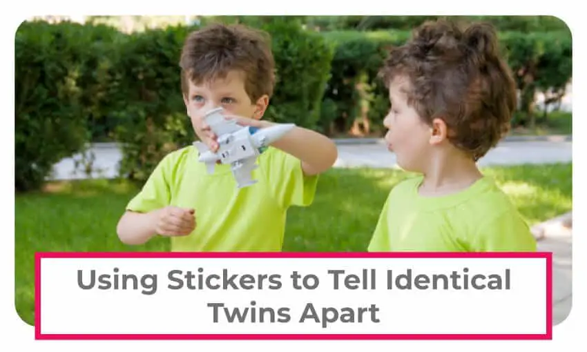 Using stickers to tell identical twins apart. 